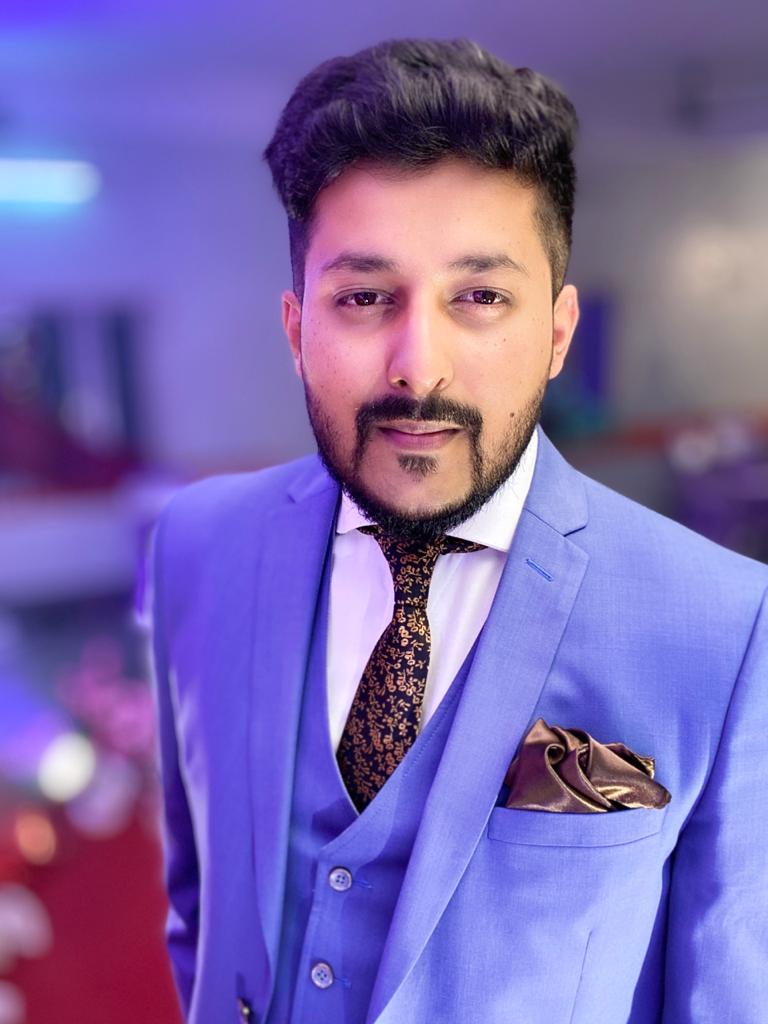 Dr. Aniket Mukherjee